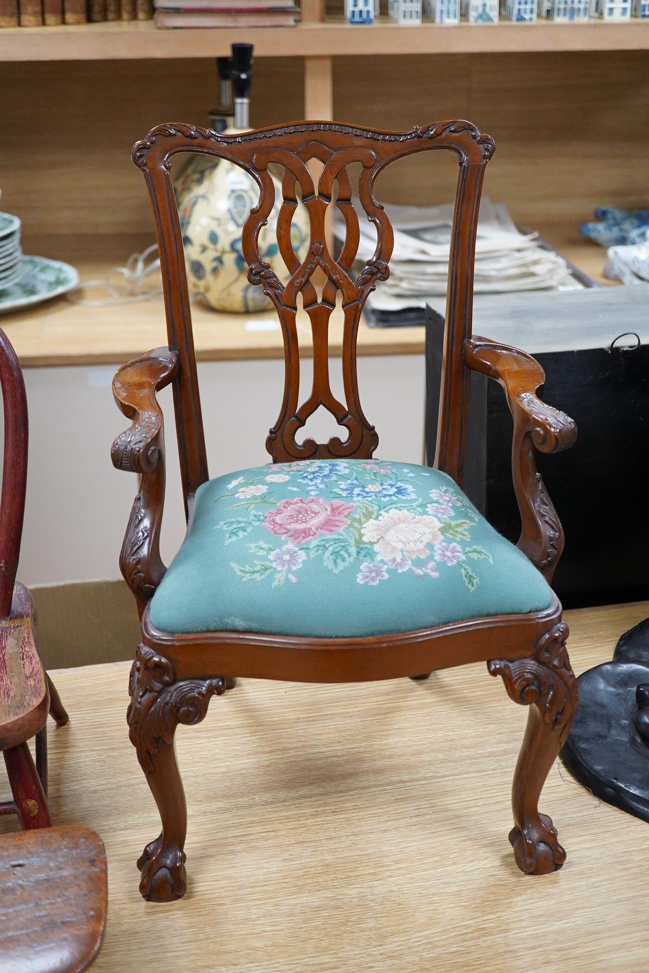 Two antique wooden stools and two children's chairs, one with arms and an upholstered seat x 51cm high